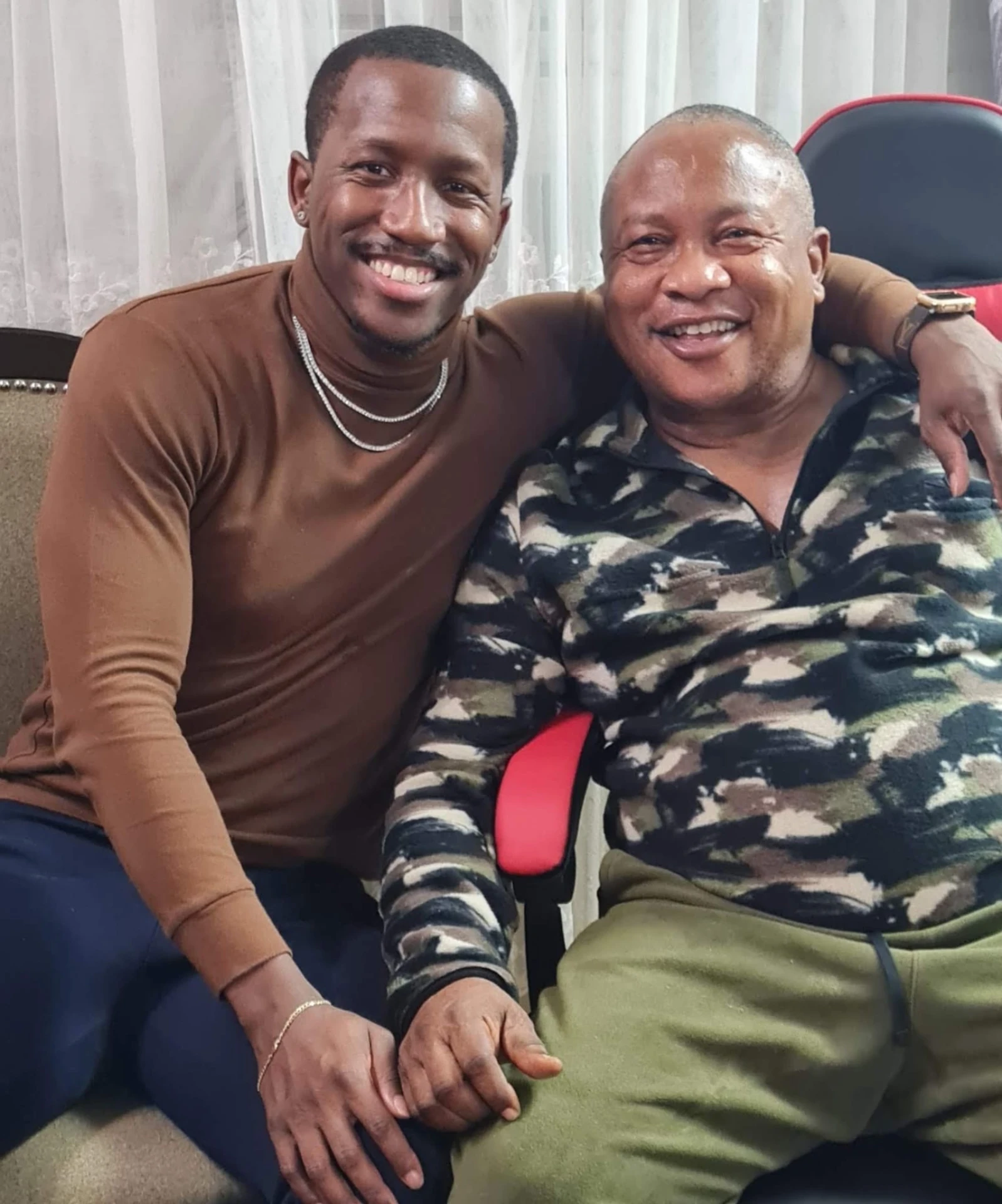 Pela with his son